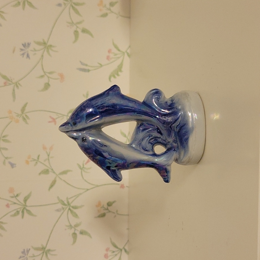 Small ceramic dolphins